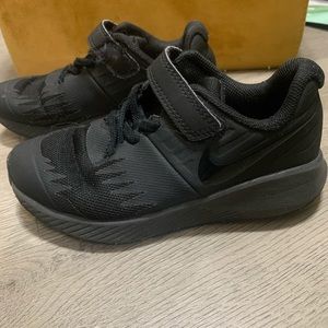 Nike Star Runner Sneakers. Boys size 12c, Color black with Velcro strap.